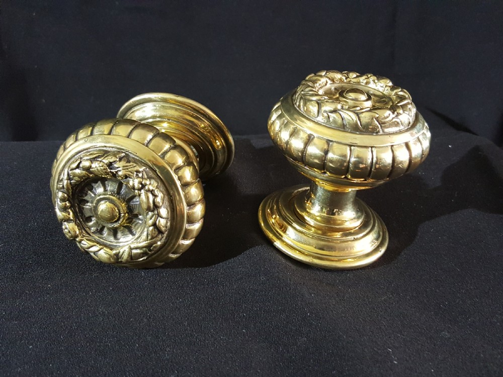 pair of regency brass door knobs