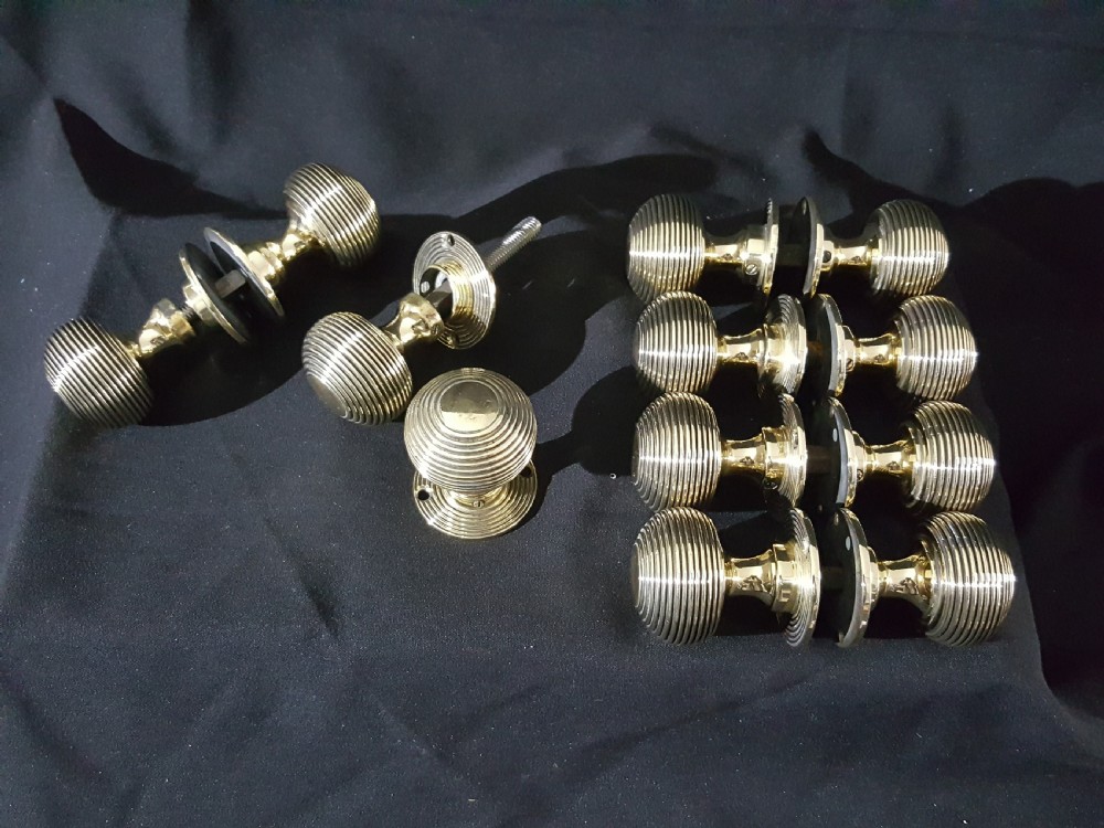 six pairs of victorian brass door knobs