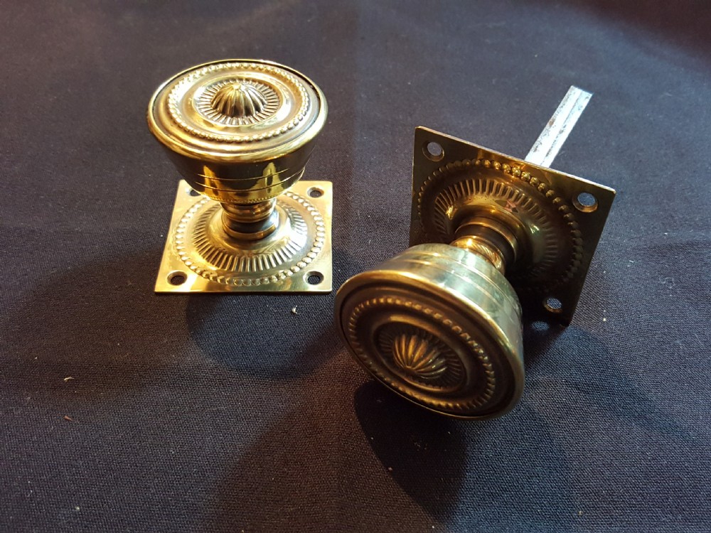 one pair of victorian brass door knobs