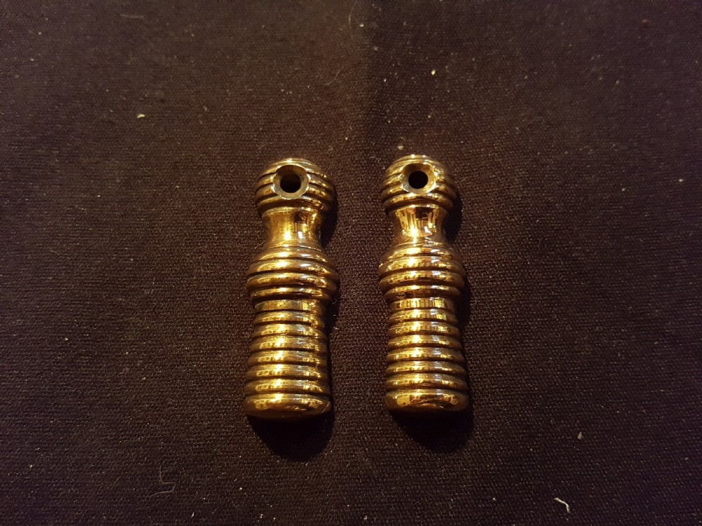 pair of brass beehive key escutcheons