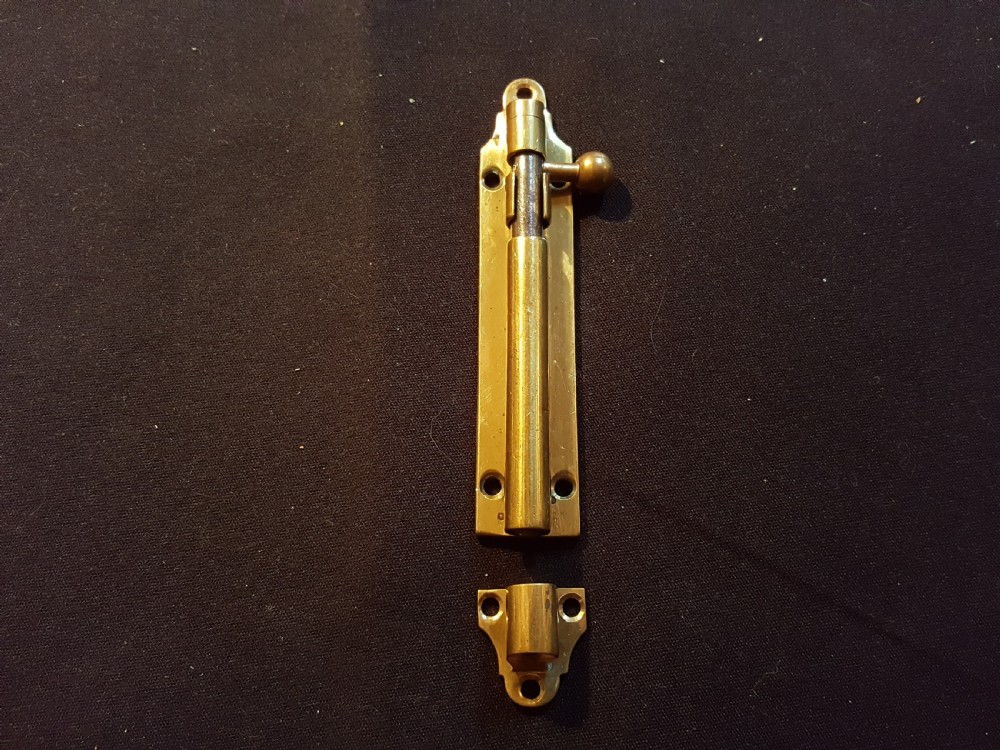 one victorian brass bolt with keep