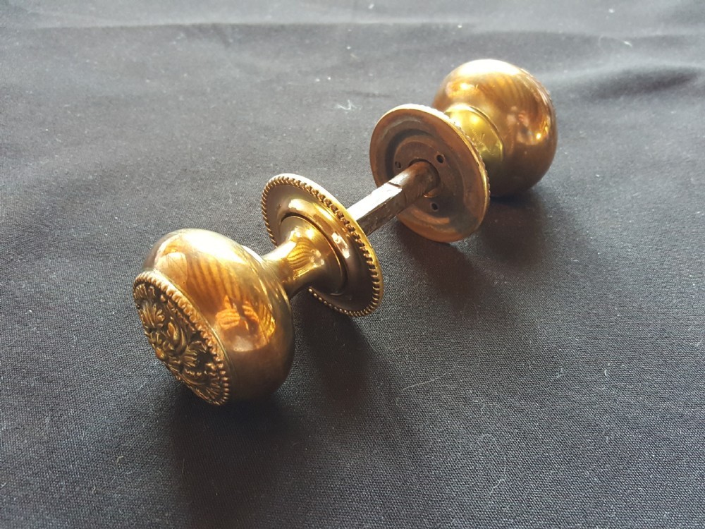 pair of regency brass door knobs