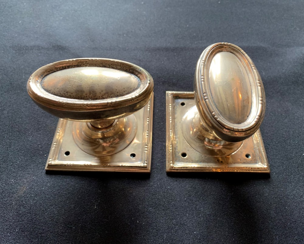 sa071 pair of bronze regency door knobs