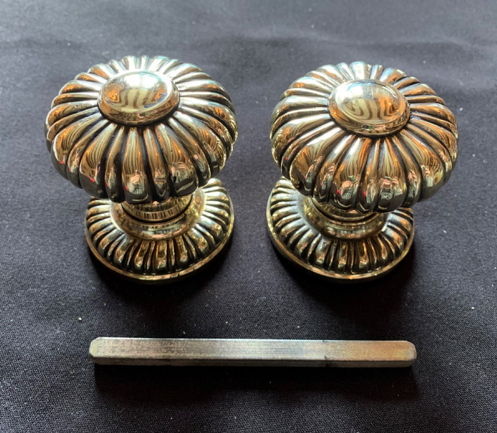 one pair of brass victorian rim lock door knobs