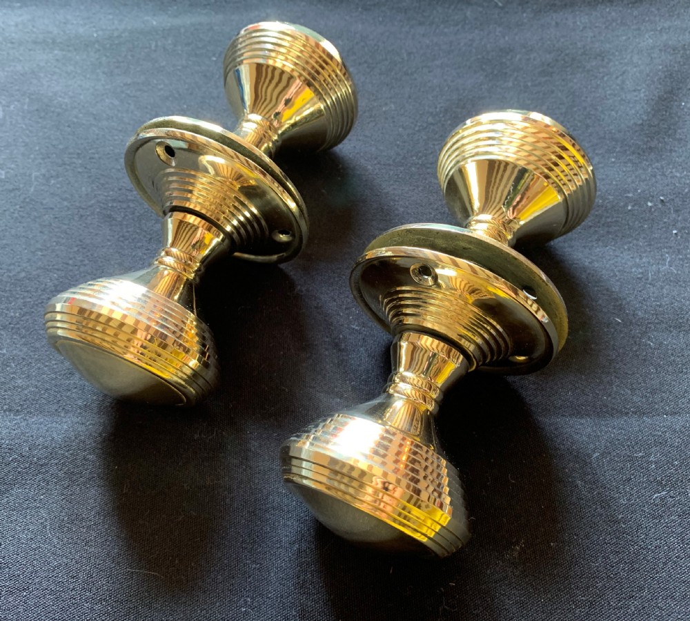 two pairs of brass victorian beehive door knobs