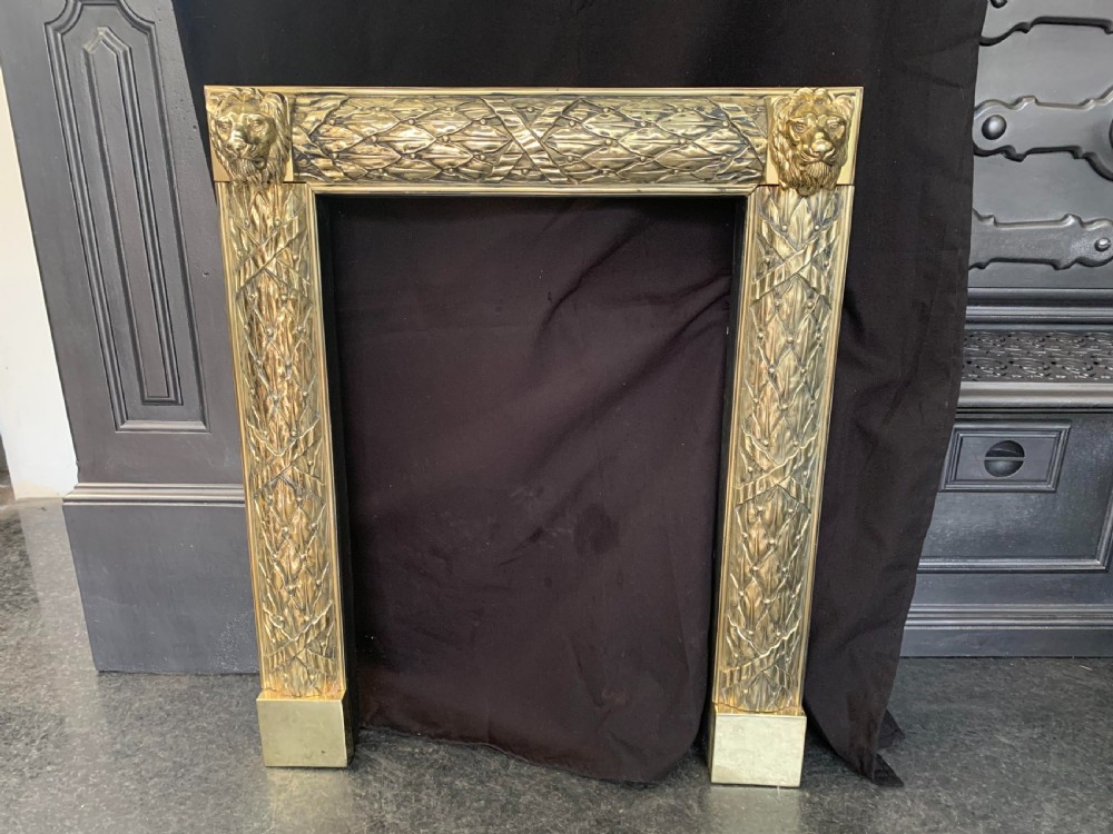 one brass victorian lion head fire surround