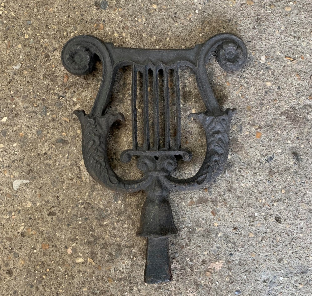 one cast iron harp shaped georgian boot scraper