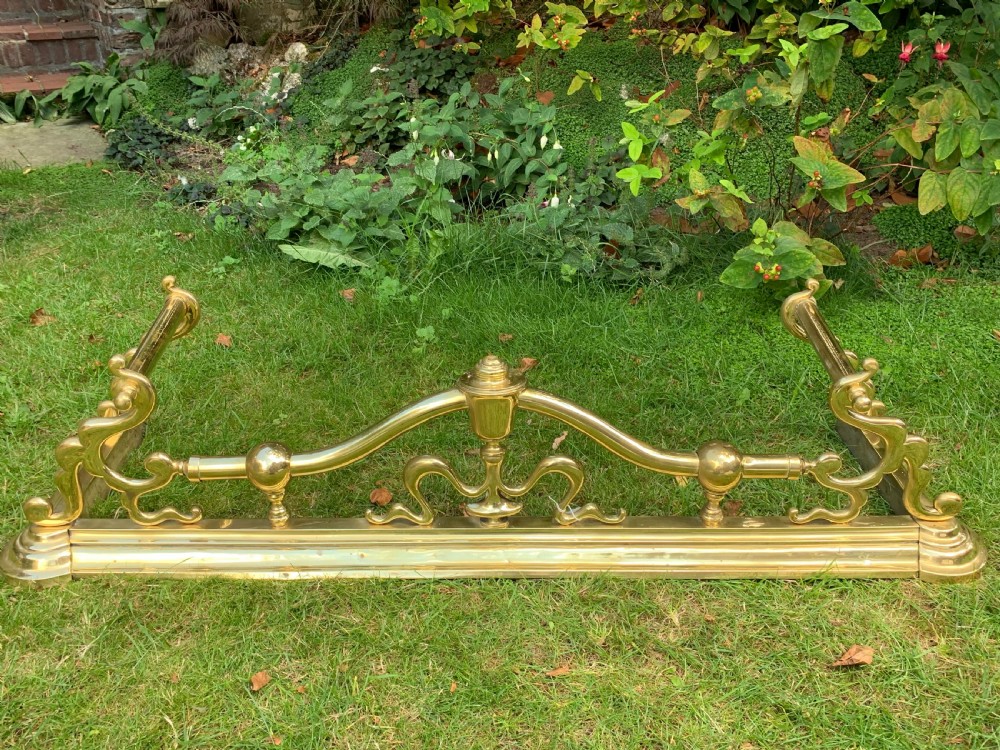 art nouveau brass fireplace fender