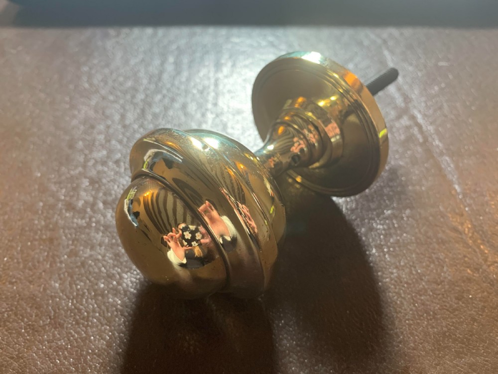 one brass georgian centre door knob